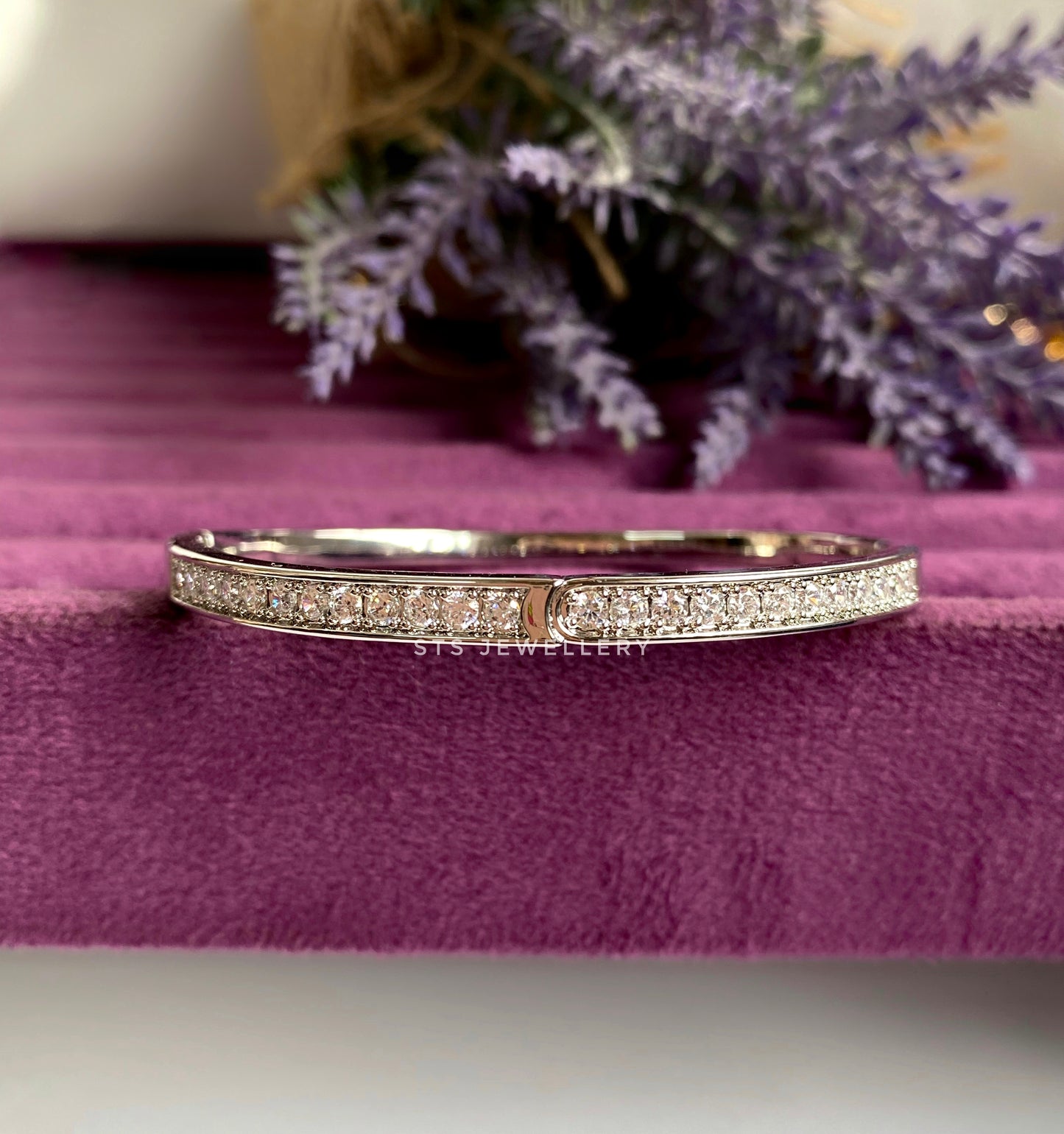 Noelle Silver Coloured Bangle Bracelet With CZ Stones- Openable